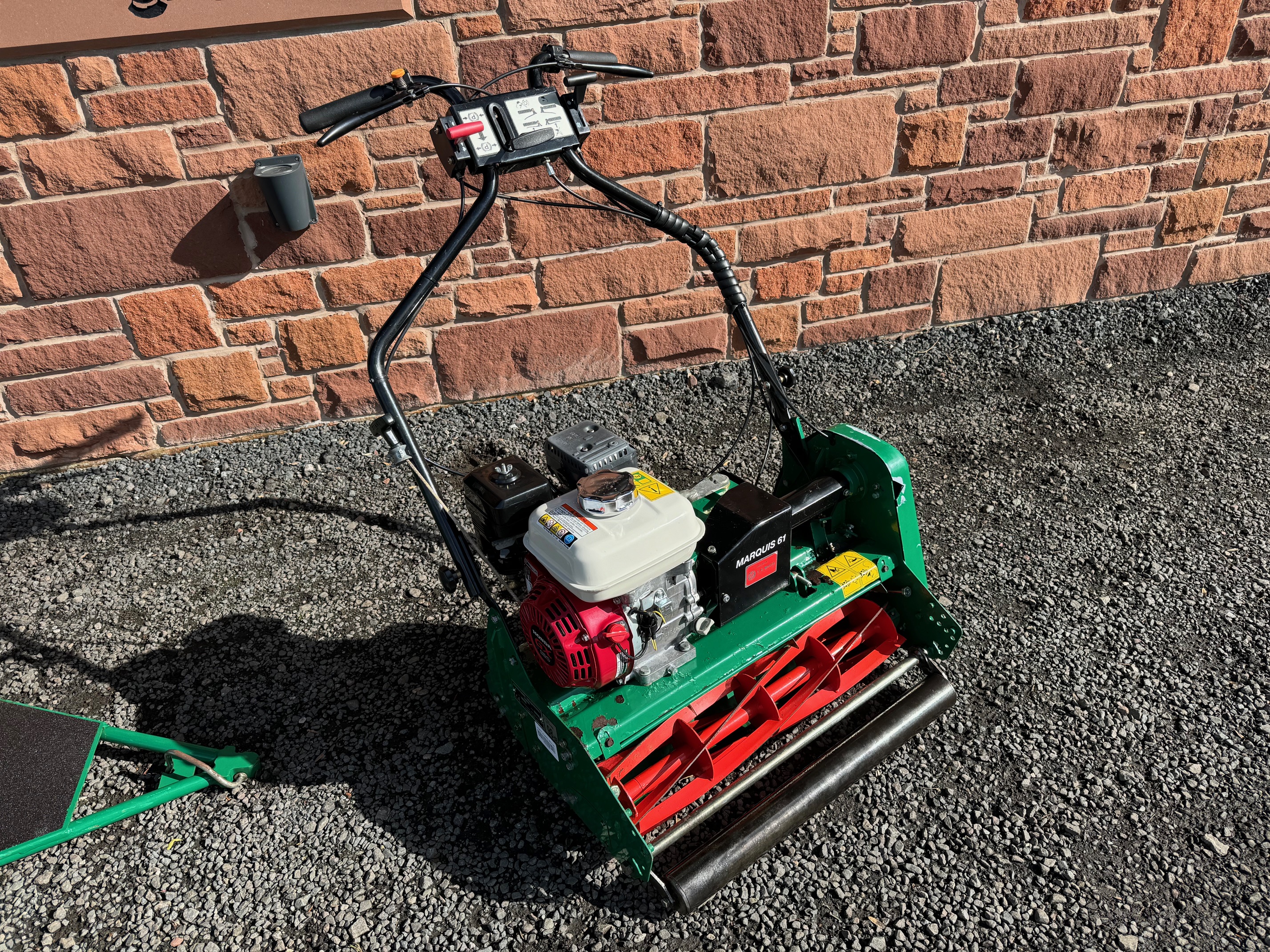 Ransomes marquis 61 cylinder mower with rollor seat